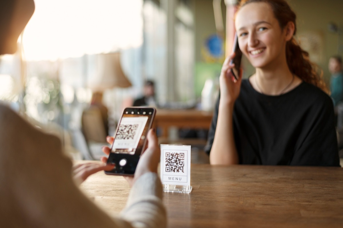 Restaurant table with a QR code menu card